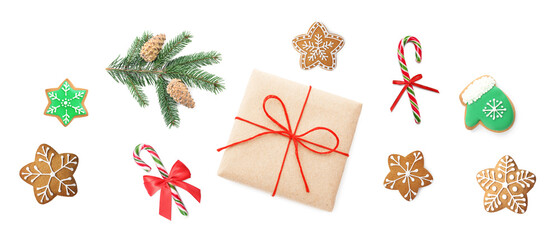 Christmas candy canes, cookies, gift box and fir tree branches isolated on white, set