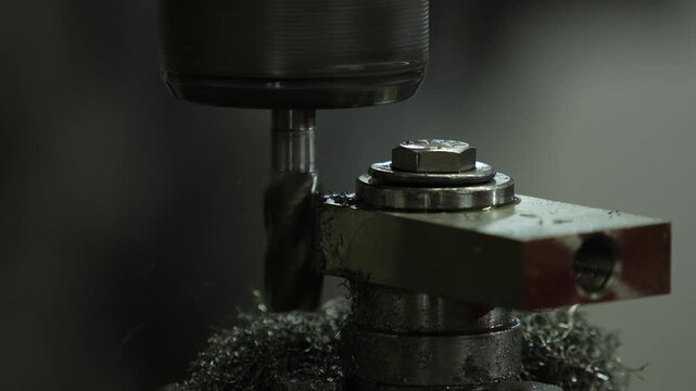 VDO 4K Lathe is working on turning metal parts for industrial use.	