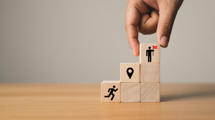 Minimalist business success concept showing teamwork, goal achievement, and leadership represented by wooden blocks and symbolic icons.