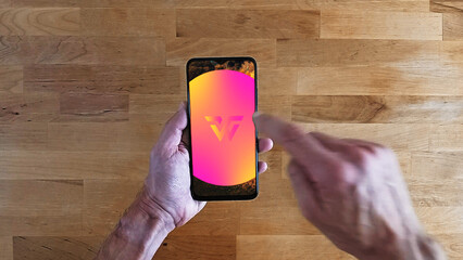 Hand Holding Smartphone Logo Reveal | Modern Mobile App Intro with Scrolling Animation