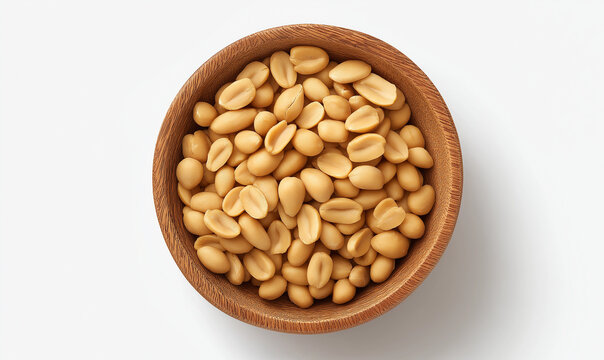 An overhead, close-up shot of a small wooden bowl filled with shelled, roasted peanuts (groundnuts), isolated on a white background.
