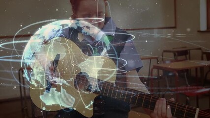 Schoolgirl strumming guitar in class, creating rotating globe network animation for education demo - Powered by Adobe
