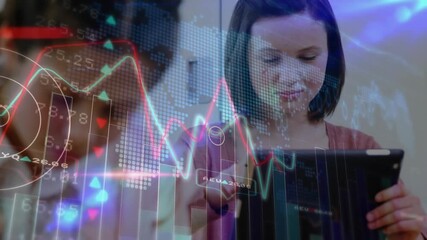 Teenage student tapping tablet and animating charts while analyzing data with sibling in classroom - Powered by Adobe