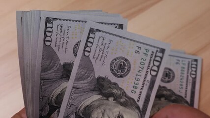 Count and organize dollars cash with ease using simple techniques in this practical demonstration