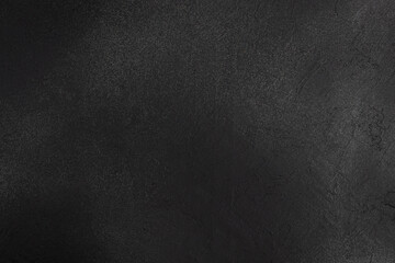 Dark textured background for food photography and culinary compositions, minimalist black stone surface with copy space for text