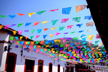 Colorful Papel Picado Banners Over Plaza (Valle de Bravo, Mexico) © Gregory