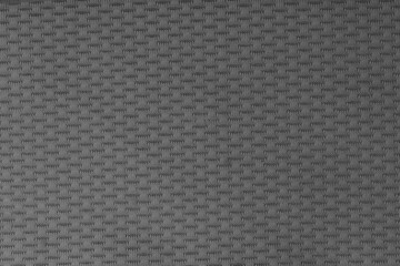 Close up of a textured gray fabric with a subtle woven pattern