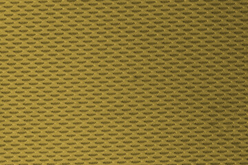 sports mesh knitted fabric close up of a textured yellow fabric with a repeating diamond pattern