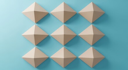 Obraz premium A grid of geometric beige diamond shapes against a teal background