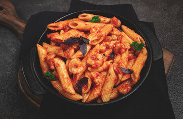 Penne pasta, with shrimp in tomato sauce, close-up, no people,