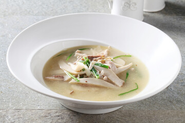 Korean chicken soup with king oyster mushrooms crafted with rich broth and tender texture. by Master Chef Hanshunseop.