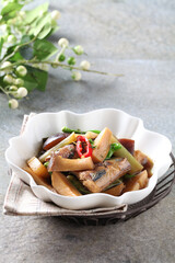 A savory Korean home-style braised dish made with pacific saury and king oyster mushrooms simmered in soy sauce. Crafted by Master Chef Hanshunseop. Photographed in Korea.