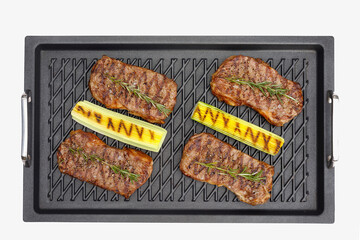 Grilled steaks on a grill pan
