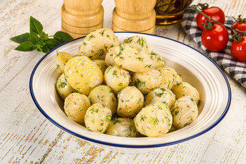 Young boiled mini potato with dill