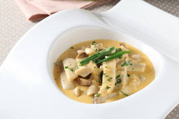 A savory Korean-style fusion dish made with tender king oyster mushrooms braised with melted...