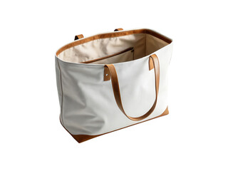 Stylish white canvas tote bag with brown leather handles isolated on transparent background, perfect for shopping, travel, or everyday use, versatile and fashionable
