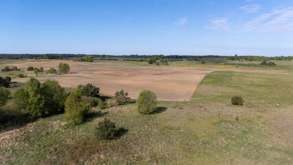 Obraz premium Aerial View of Rural Fields and Trees
