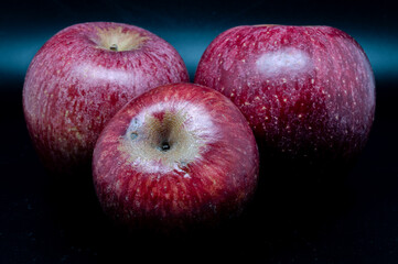 A composition of a typically autumnal fruit, such as the Annurca apples from Campania, which enhances its beauty and details.