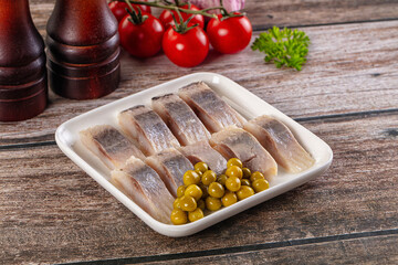 Slided marinated salted herring fillet