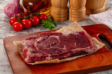 Gourmet raw rib eye steak