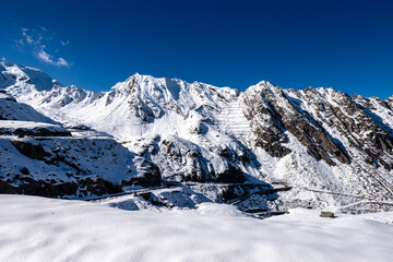 View of the Snow  Transfagarasan Highway Mountain Road in sunny day, Carpathians, Romania