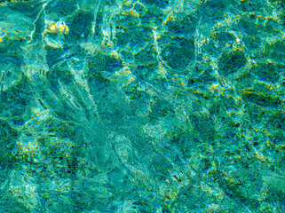 Abstract reflexions of water surface of Jasna Lake in Slovenia, Europe