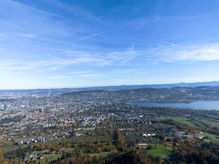 Aerial view of Swiss city of Zürich with Lake Zurich seen from local mountain Uetliberg on a sunny autumn day. Photo taken October 29th, 2025, Zurich, Switzerland.