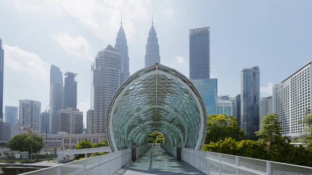 Kuala Lumpur skyline from pedestrian bridge across the Klang River