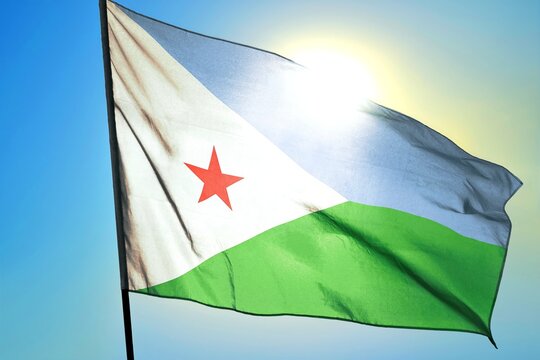 Djibouti flag on sunny sky background