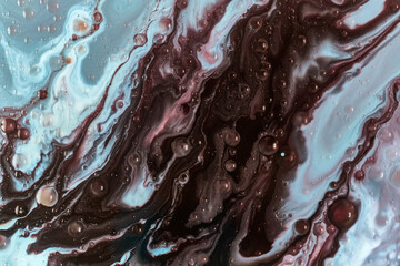 Abstract macro of dark brown and blue swirling fluid texture. Great for backgrounds, luxury product packaging, textile prints, and web banners