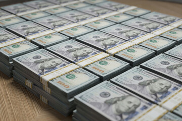 Stacks of hundred-dollar bills, symbolizing finance, wealth, accounting, investment, and business...