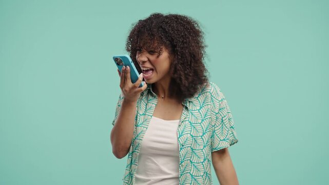 Annoyed Outraged African Woman Quarreling Talking On Mobile Phone. Angry Lady 