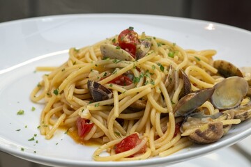 Traditional Italian pasta dish with perfectly cooked noodles and vibrant sauce in restaurant