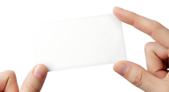 A person holding a blank white card between their fingers against a black background studio shot