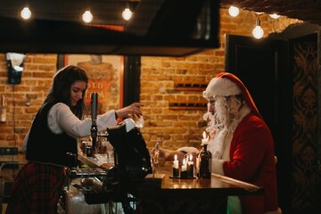 Santa claus unwinding at a cozy bar