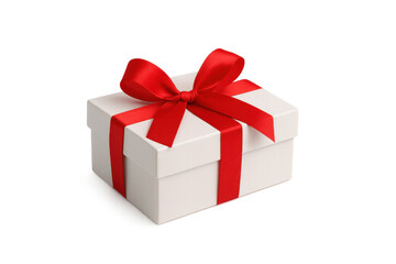 Obraz premium White gift box with red ribbon and bow celebrating holidays, birthdays, and special occasions