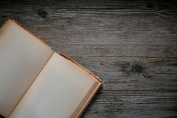 Flat Lay of Old Book and Planks