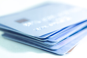 Credit cards isolated on white background. Selective focus. Shallow DOF.