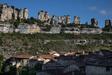Panoramic view of the picturesque town of Orbaneja del Castillo, located in the Sedano Valley,...