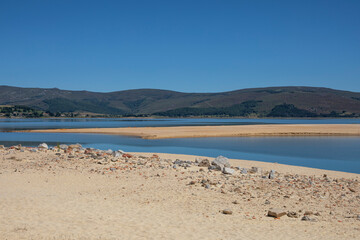  Sandy beach of Arija on the Ebro reservoir one summer day