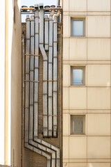 metal collectors on the facade of a building
