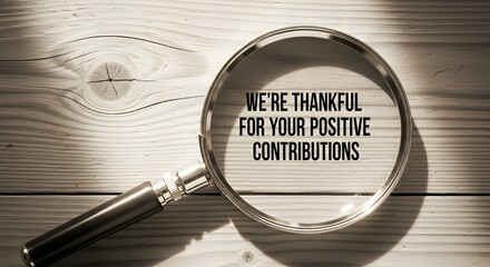 Show your appreciation with this Thankful message for positive contributions, ideal for employee recognition or customer gratitude on a rustic wooden background