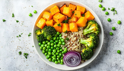 Vegetarian quinoa and broccoli warm salad with baked butternut squash or pumpkin, green peas and fresh red onion, top down view