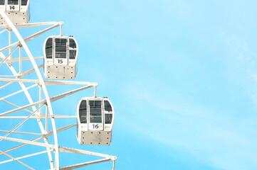 Photo Of Ferris Wheel On Blue Sky Background