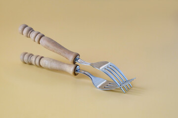 Two connected forks, Concept of creativity and playfulness,