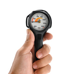 Hand holding a submersible pressure gauge