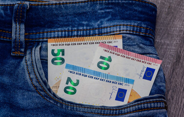 Various Denomination Euro Notes in Denim Pocket