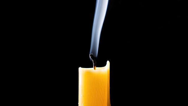 Close-up of an extinguished yellow candle with delicate smoke trail curling upward in soft light against a deep black background, symbolizing peace, memory, and the passage of time