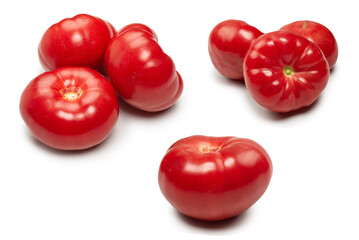 Red fresh tomato isolated on white background.