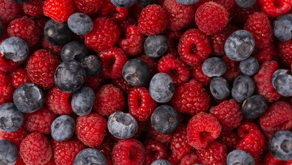 Raspberry, blueberry as a background.
